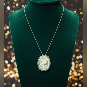 Elegant Light Green Cameo with Emerald Green Colored Stones Set in Silvertone